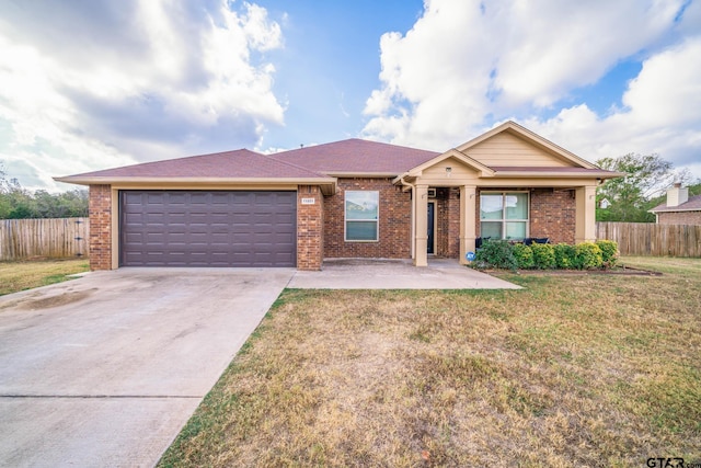 single story home with a front lawn and a garage