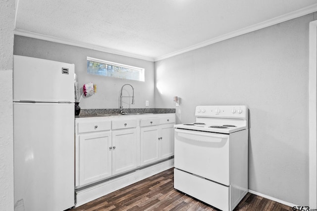 kitchen with sink, white cabinets, dark wood-type flooring, and white appliances