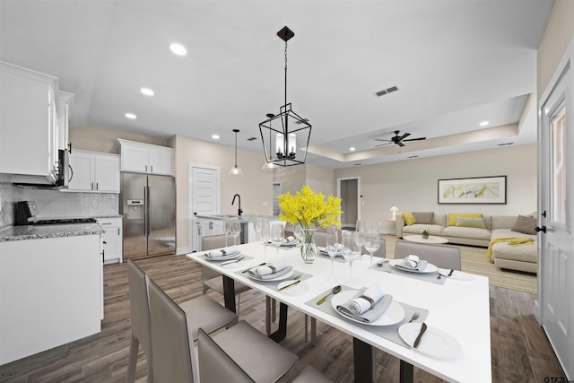 16221 Crossing Cir, Lindale, TX 75771 - kitchen featuring stainless steel appliances, ceiling fan, tasteful backsplash, white cabinets, and recessed lighting