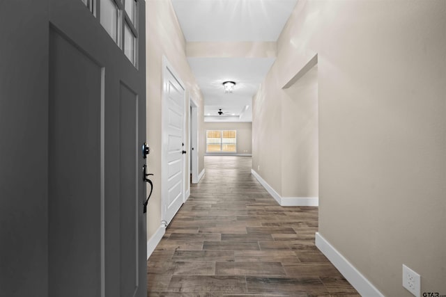 hall with hardwood / wood-style floors