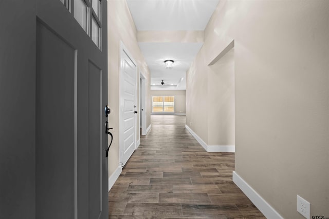 16221 Crossing Cir, Lindale, TX 75771 - hallway with dark wood-style flooring and baseboards