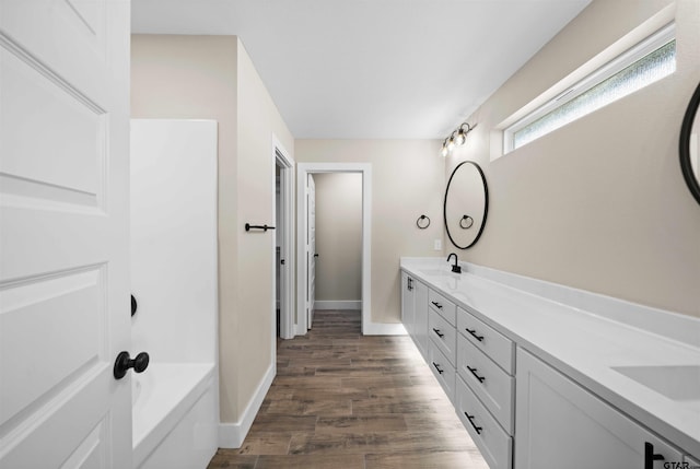 16221 Crossing Cir, Lindale, TX 75771 - bathroom with double vanity and wood finished floors