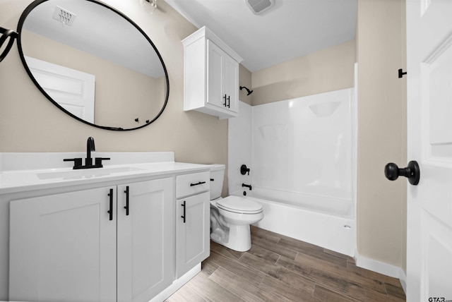 16221 Crossing Cir, Lindale, TX 75771 - bathroom featuring vanity, wood finished floors, and shower / bath combination