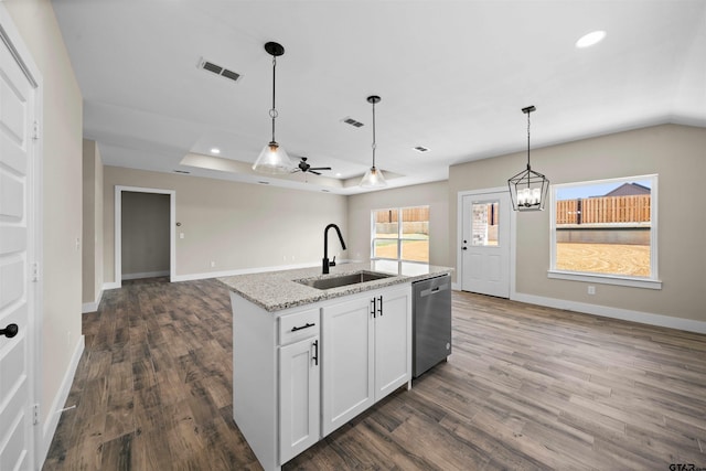 16221 Crossing Cir, Lindale, TX 75771 - kitchen with dishwasher, dark wood-style floors, open floor plan, ceiling fan, and a tray ceiling