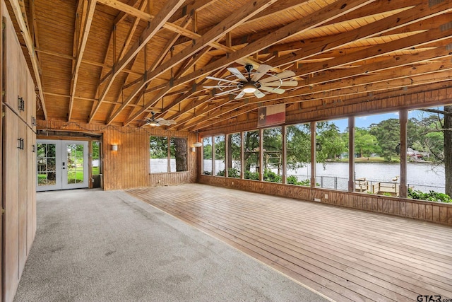 488 Omaha Dr, Omaha, TX 75571 - unfurnished sunroom featuring a water view, french doors, and vaulted ceiling