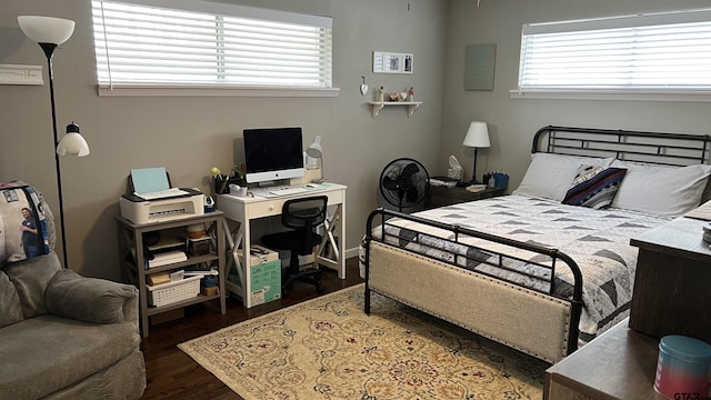 bedroom with wood finished floors