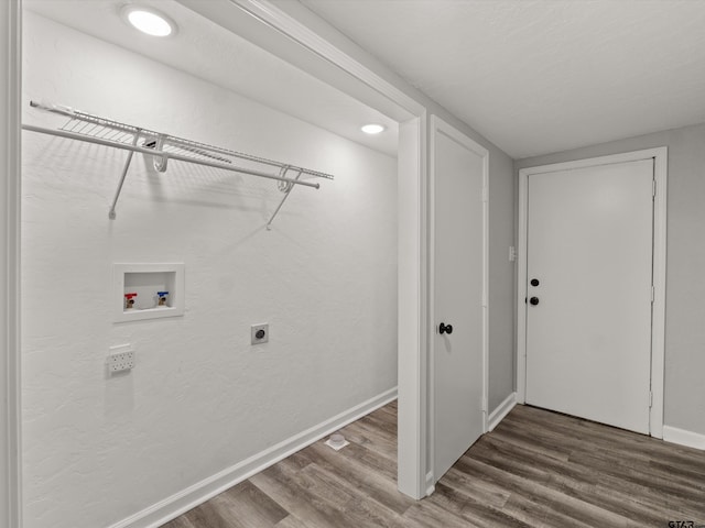 laundry room with hookup for an electric dryer, washer hookup, and hardwood / wood-style floors