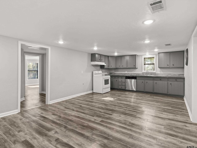 kitchen featuring sink, dishwasher, white electric range, dark hardwood / wood-style flooring, and gray cabinets