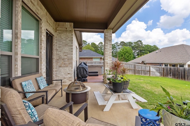 9157 Teal Flight Way, Tyler, TX 75703 - view of patio with an outdoor living space with a fire pit