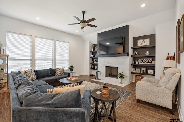 9157 Teal Flight Way, Tyler, TX 75703 - living area with a ceiling fan, wood finished floors, a premium fireplace, baseboards, and recessed lighting