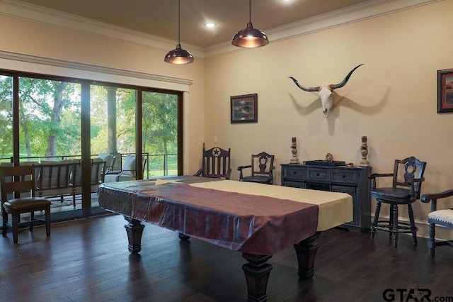 rec room with ornamental molding, pool table, and dark hardwood / wood-style flooring