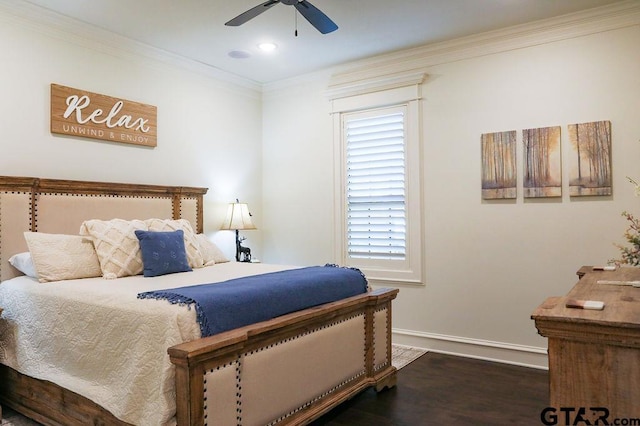 bedroom with multiple windows, dark hardwood / wood-style flooring, ornamental molding, and ceiling fan