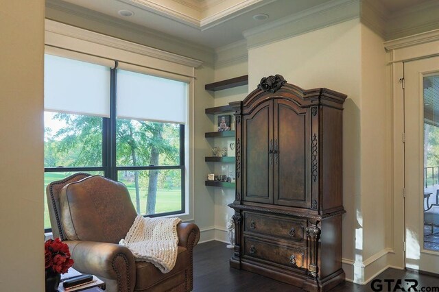 bathroom featuring vanity, a bathing tub, and ornamental molding