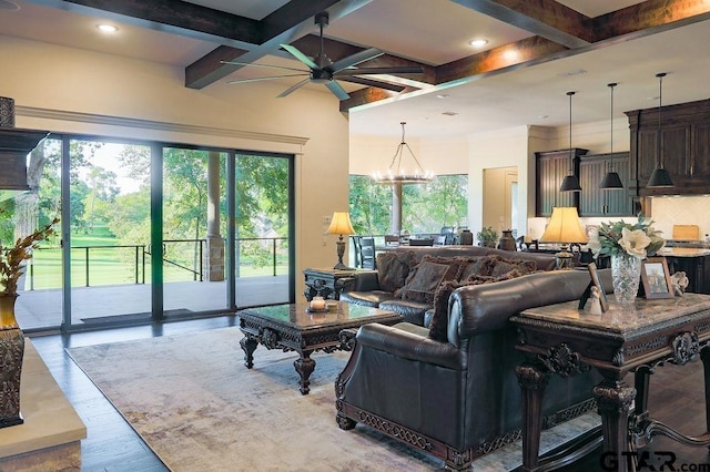 living room with beamed ceiling, coffered ceiling, ceiling fan with notable chandelier, and light hardwood / wood-style floors