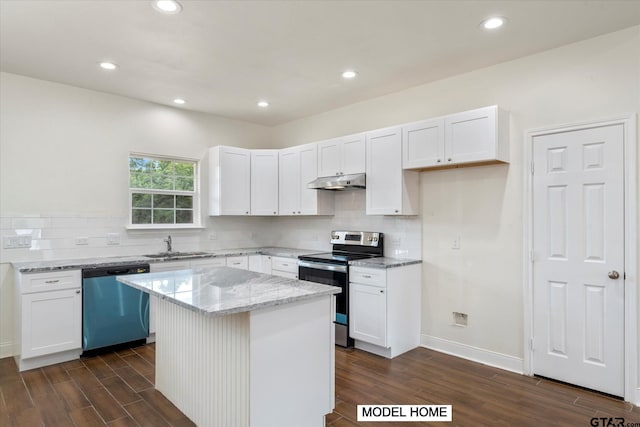 kitchen featuring stainless steel appliances, a center island, dark hardwood / wood-style floors, light stone countertops, and white cabinetry