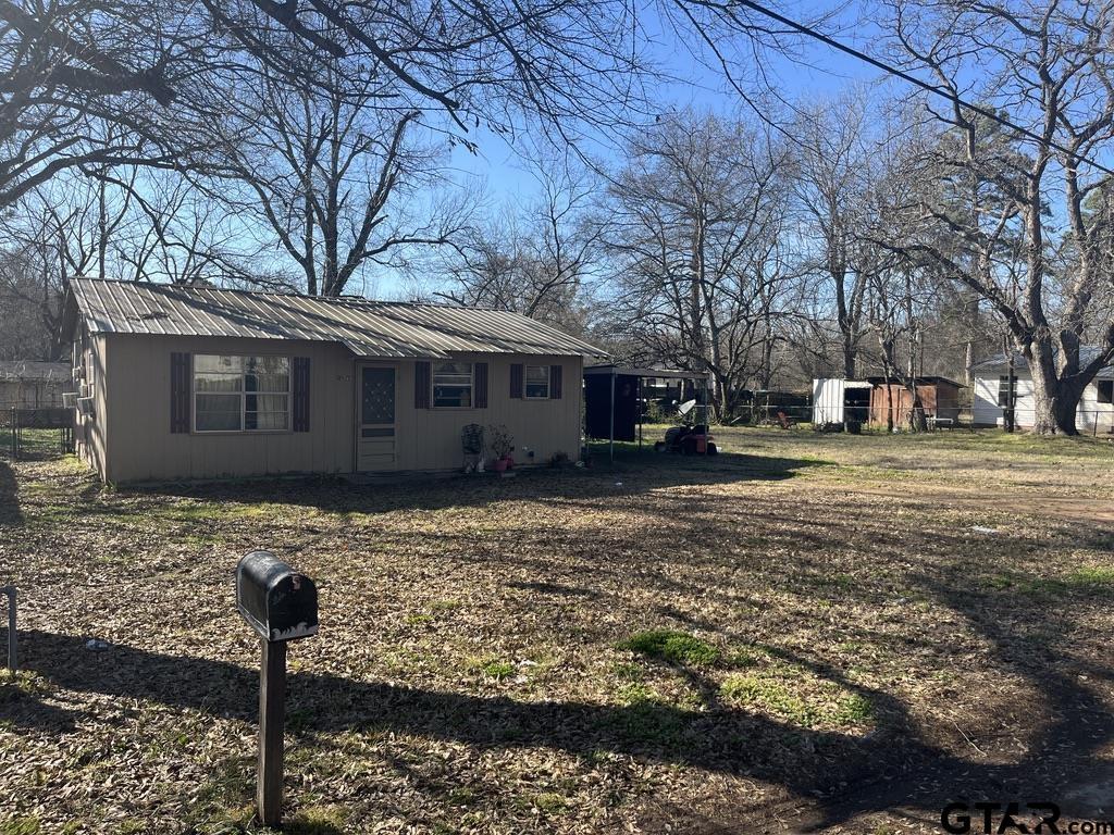 view of home's exterior featuring metal roof