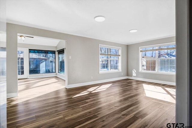 unfurnished living room featuring hardwood / wood-style floors, ceiling fan, and ornamental molding