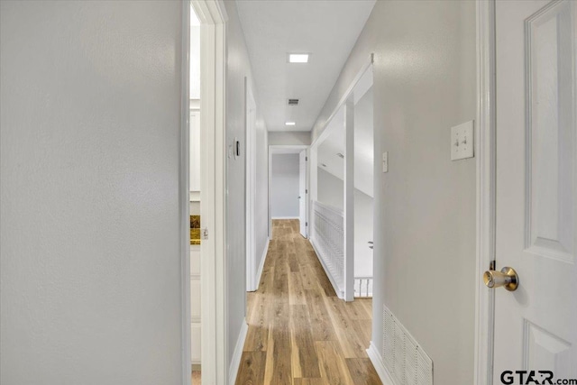 hall featuring light hardwood / wood-style floors