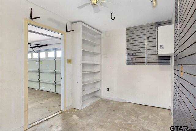 interior space featuring ceiling fan