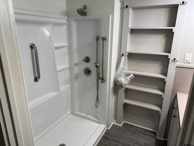 2595 Fm 1857 S, Rusk, TX 75785 - bathroom with a stall shower and wood finished floors