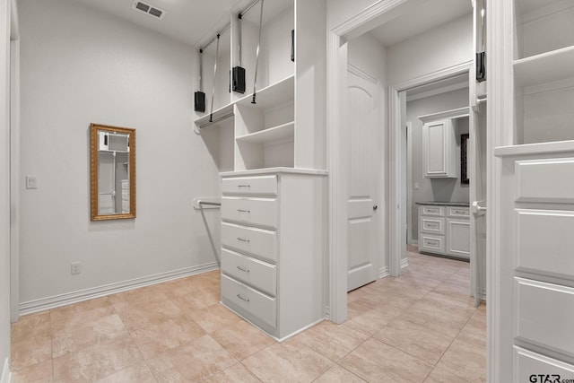spacious closet with visible vents