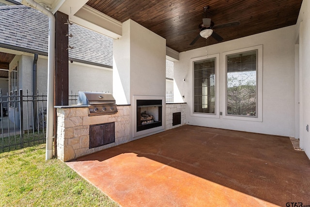 view of patio with fence, grilling area, a ceiling fan, and area for grilling