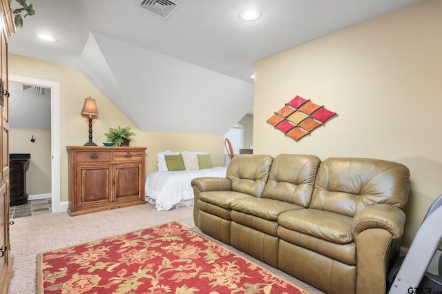 carpeted bedroom with vaulted ceiling