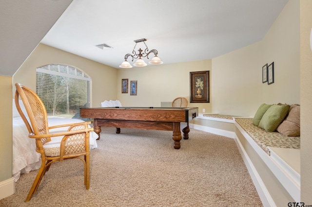 game room featuring carpet and a chandelier