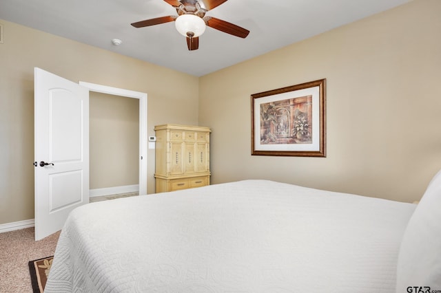 bedroom featuring ceiling fan and carpet floors