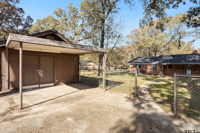 view of outbuilding with a lawn