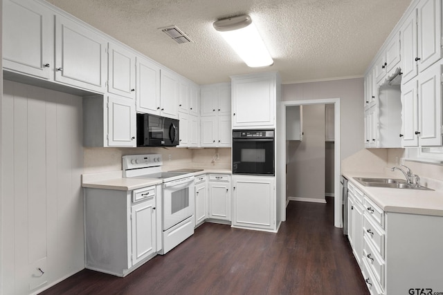 kitchen featuring dark hardwood / wood-style flooring, crown molding, sink, black appliances, and white cabinets