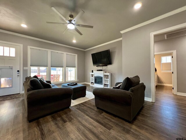 kitchen featuring stainless steel appliances, a kitchen breakfast bar, a kitchen island, and white cabinets