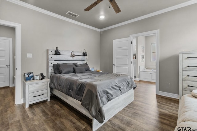 bedroom featuring ornamental molding, ensuite bathroom, ceiling fan, and dark hardwood / wood-style flooring