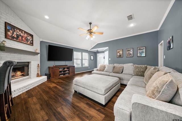 7032 La Hacienda Dr, Flint, TX 75762 - living area featuring wood finished floors, a ceiling fan, crown molding, a brick fireplace, and lofted ceiling