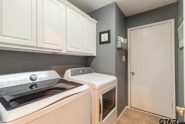 7032 La Hacienda Dr, Flint, TX 75762 - laundry area with separate washer and dryer and cabinet space