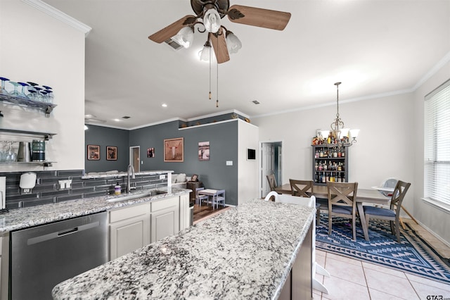 7032 La Hacienda Dr, Flint, TX 75762 - kitchen featuring a sink, stainless steel dishwasher, ceiling fan, ornamental molding, and a peninsula