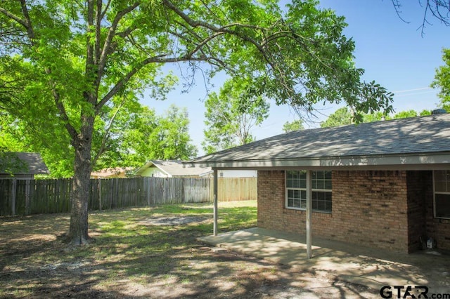 12595 Oneall St, Tyler, TX 75704 - fenced backyard featuring a patio area