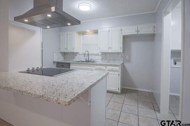 12595 Oneall St, Tyler, TX 75704 - kitchen with island range hood, a sink, black electric cooktop, white cabinetry, and tasteful backsplash