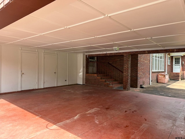 basement with brick wall