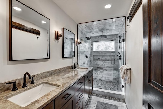 bathroom featuring tile patterned flooring, vanity, and an enclosed shower