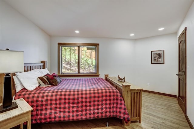 bedroom featuring light hardwood / wood-style floors