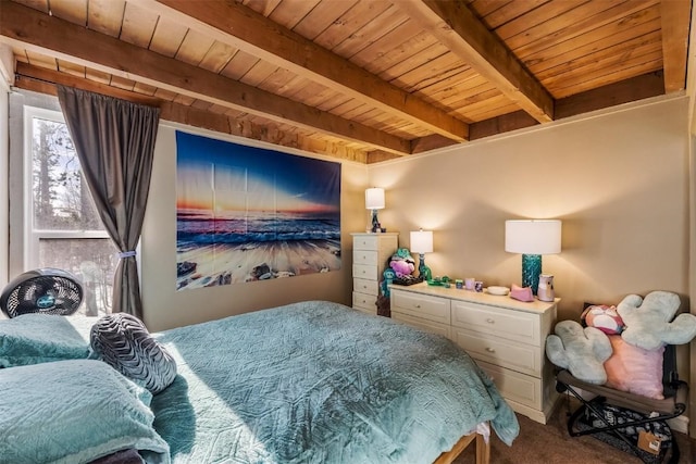 carpeted bedroom featuring beamed ceiling and wood ceiling