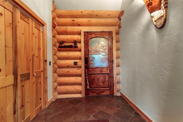 doorway with log walls