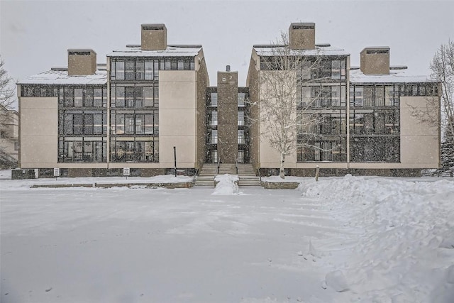 view of snow covered building