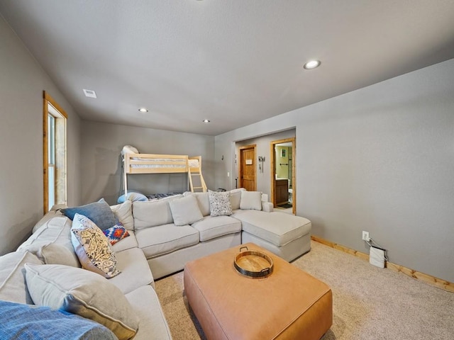 living room with light colored carpet