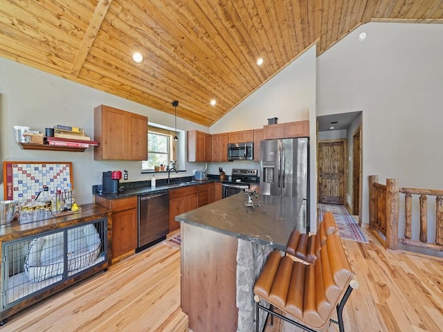 kitchen featuring decorative light fixtures, light hardwood / wood-style floors, high vaulted ceiling, appliances with stainless steel finishes, and wooden ceiling