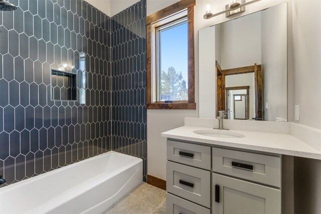 bathroom featuring shower / tub combination, vanity, and tile patterned floors