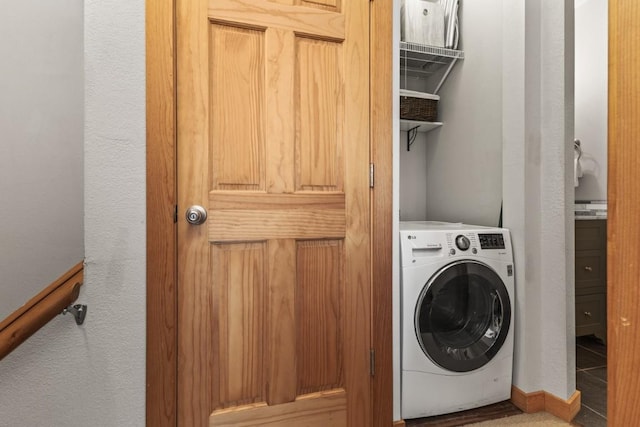 washroom featuring washer / clothes dryer