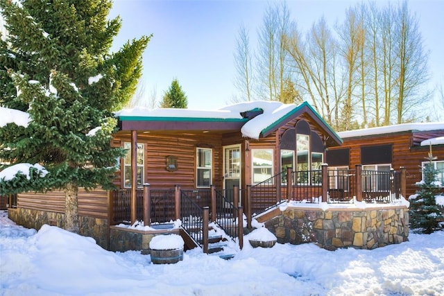 view of log cabin