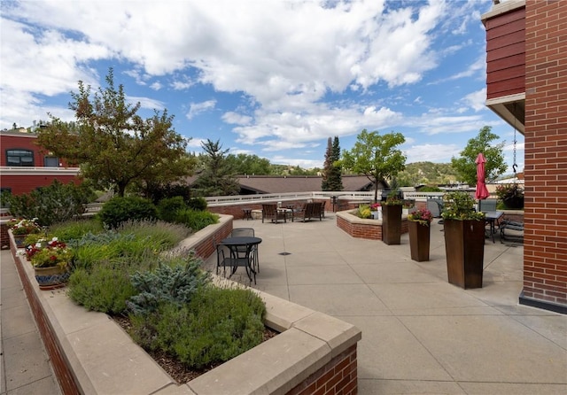 view of patio featuring outdoor dining area